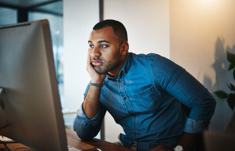 frustrated man using computer