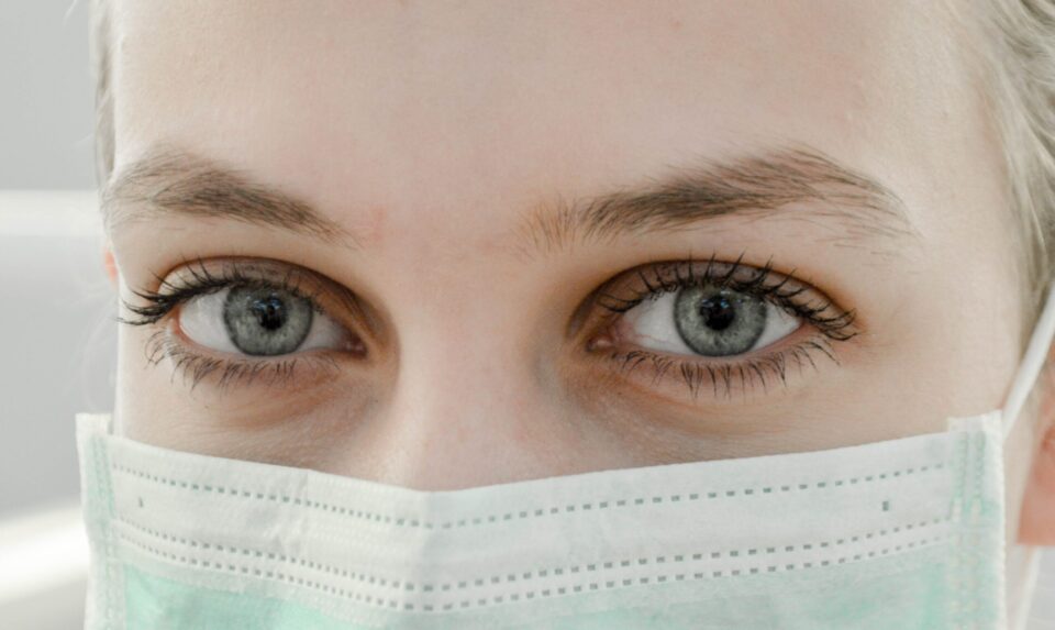 close up of dentist in mask