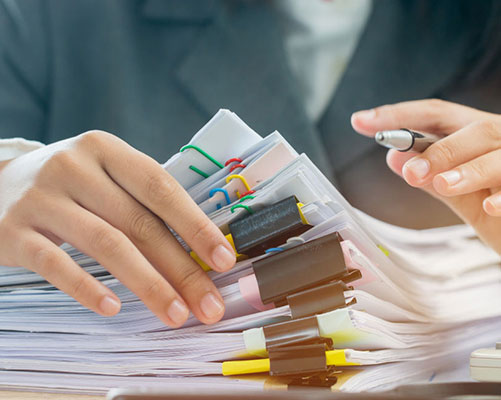 teacher marking papers